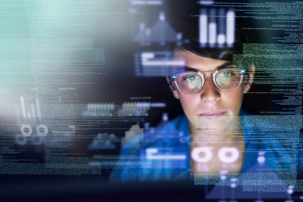 Woman with coding and graphs around