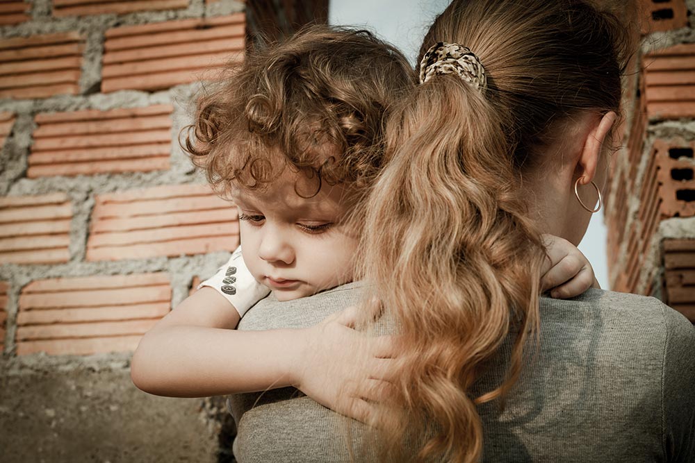 Woman holding child