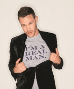 Will Young wearing a t-shirt that says 'I'm a real man'